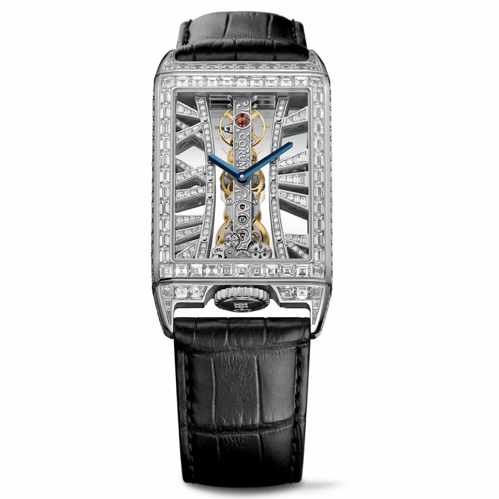 The blue baton-shaped hands are striking contrast to the diamonds paved dial.