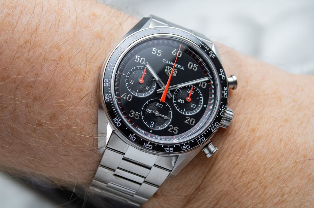 Black dial TAG Heuer Carrera Sport style chronograph on a wrist